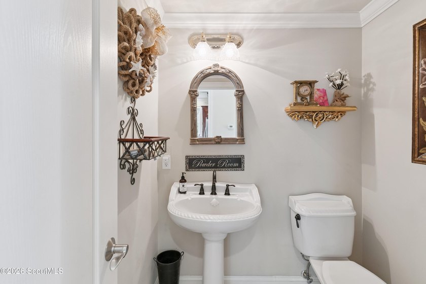 Your coastal oasis awaits! Exceptionally maintained custom-built - photo 25