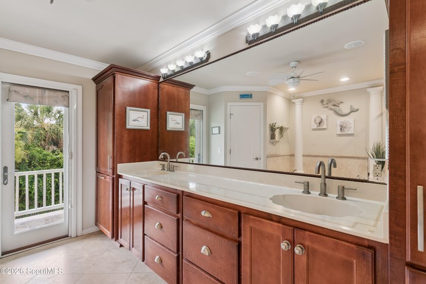 Your coastal oasis awaits! Exceptionally maintained custom-built - photo 26