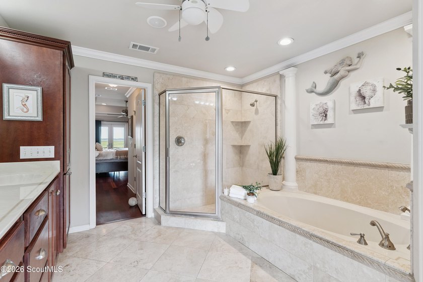 Your coastal oasis awaits! Exceptionally maintained custom-built - photo 27
