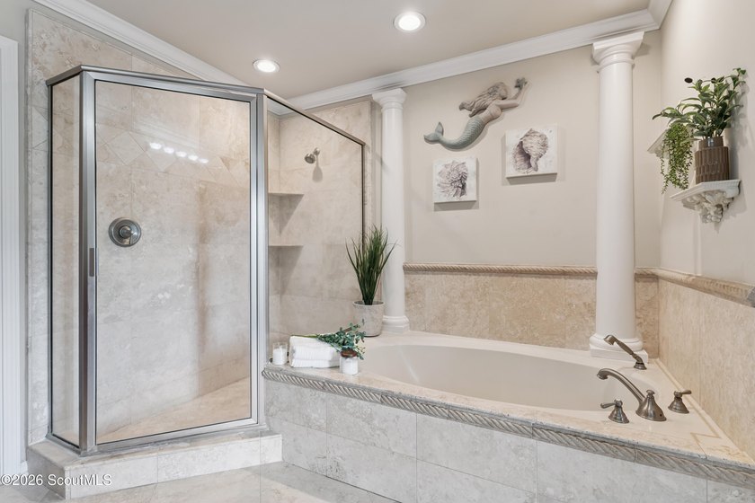 Your coastal oasis awaits! Exceptionally maintained custom-built - photo 28