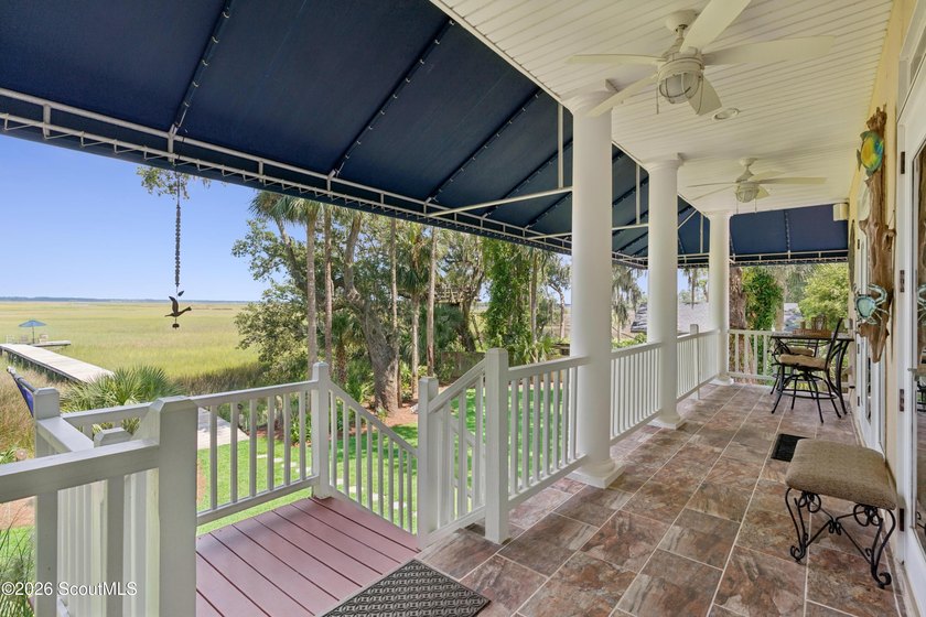 Your coastal oasis awaits! Exceptionally maintained custom-built - photo 31