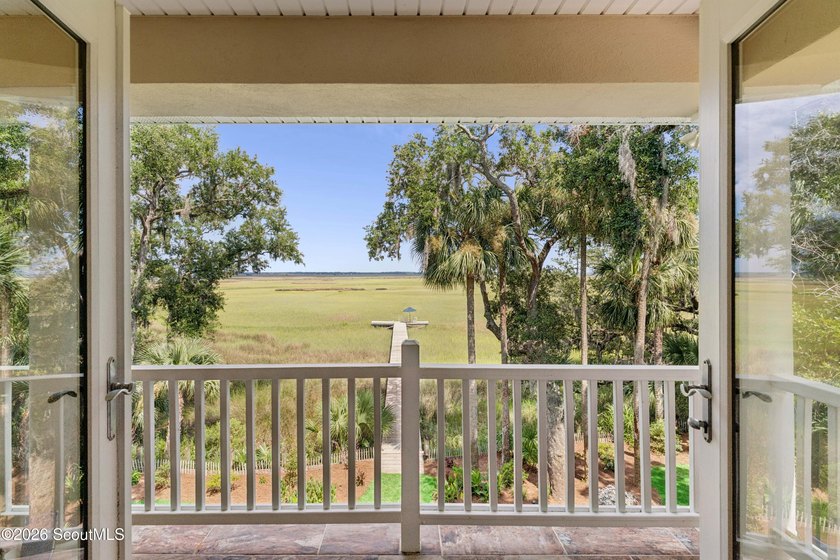 Your coastal oasis awaits! Exceptionally maintained custom-built - photo 33