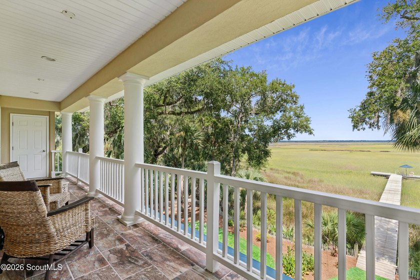 Your coastal oasis awaits! Exceptionally maintained custom-built - photo 34