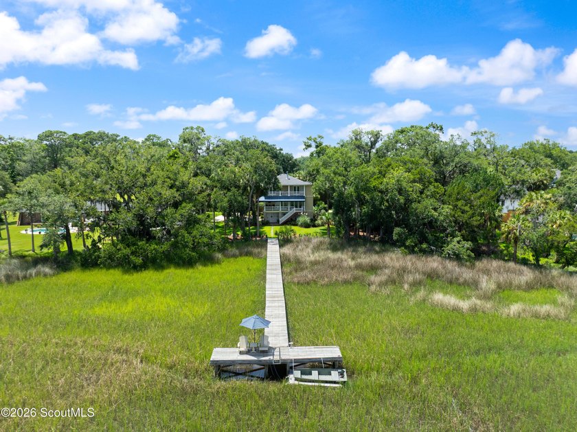 Your coastal oasis awaits! Exceptionally maintained custom-built - photo 37