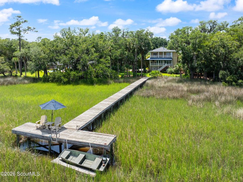 Your coastal oasis awaits! Exceptionally maintained custom-built - photo 38
