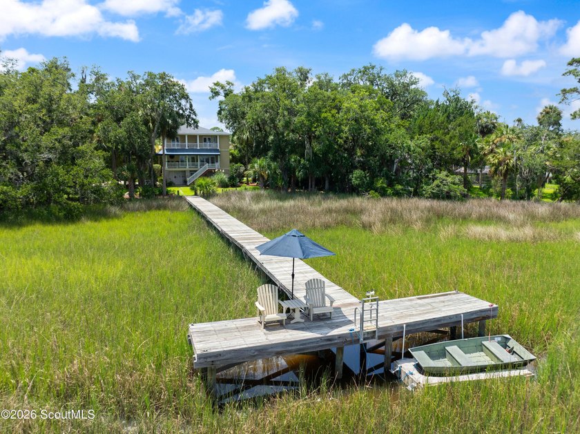 Your coastal oasis awaits! Exceptionally maintained custom-built - photo 39