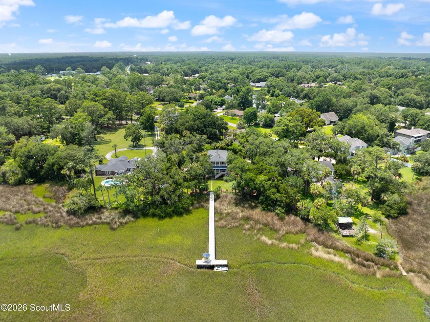 Your coastal oasis awaits! Exceptionally maintained custom-built - photo 40