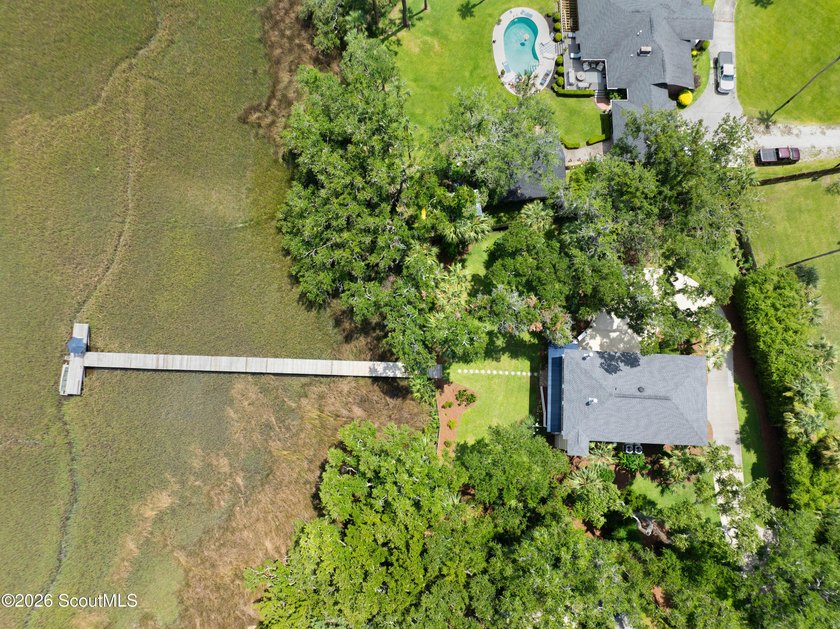 Your coastal oasis awaits! Exceptionally maintained custom-built - photo 41