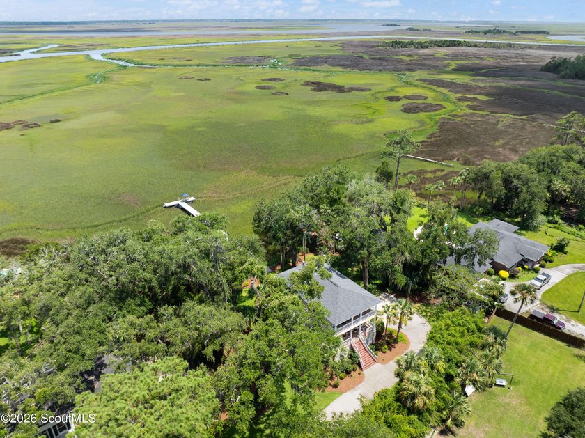 Your coastal oasis awaits! Exceptionally maintained custom-built - photo 43