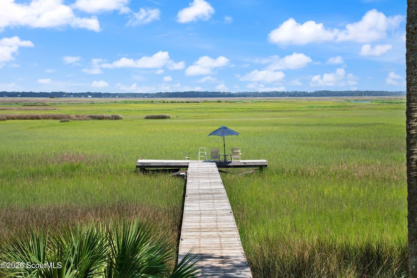 Your coastal oasis awaits! Exceptionally maintained custom-built - photo 45