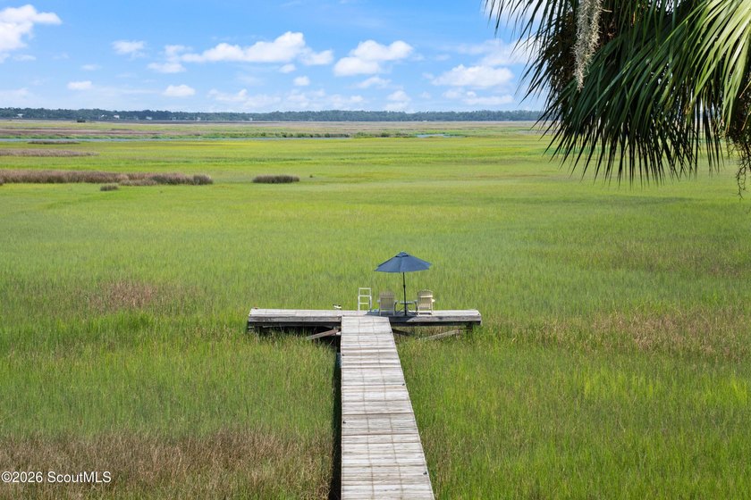 Your coastal oasis awaits! Exceptionally maintained custom-built - photo 46