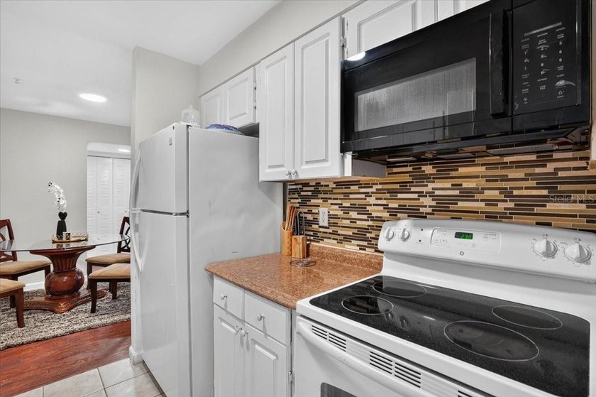 Welcome to this well-maintained, fully furnished ground-floor - photo 12