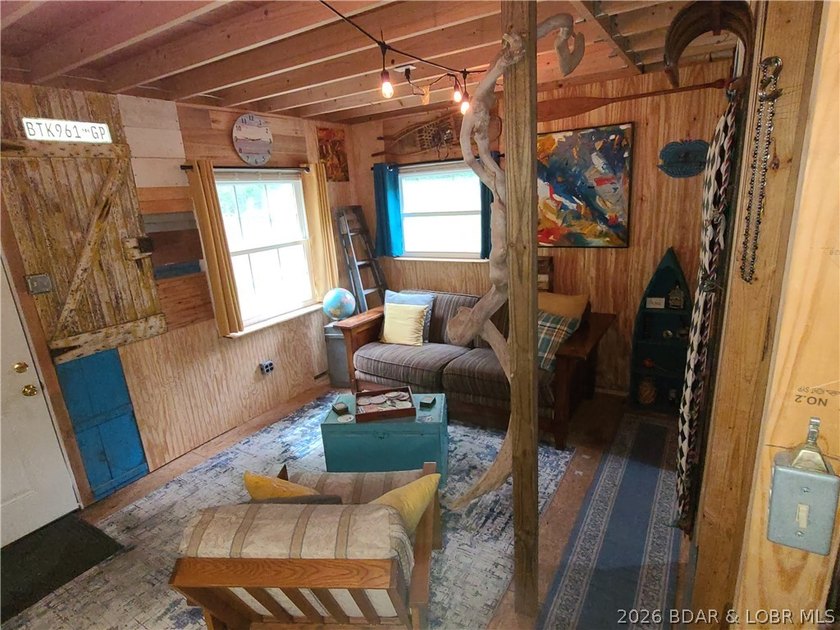 Featuring five acres of wooded privacy and a rustic cabin. Enjoy - photo 17