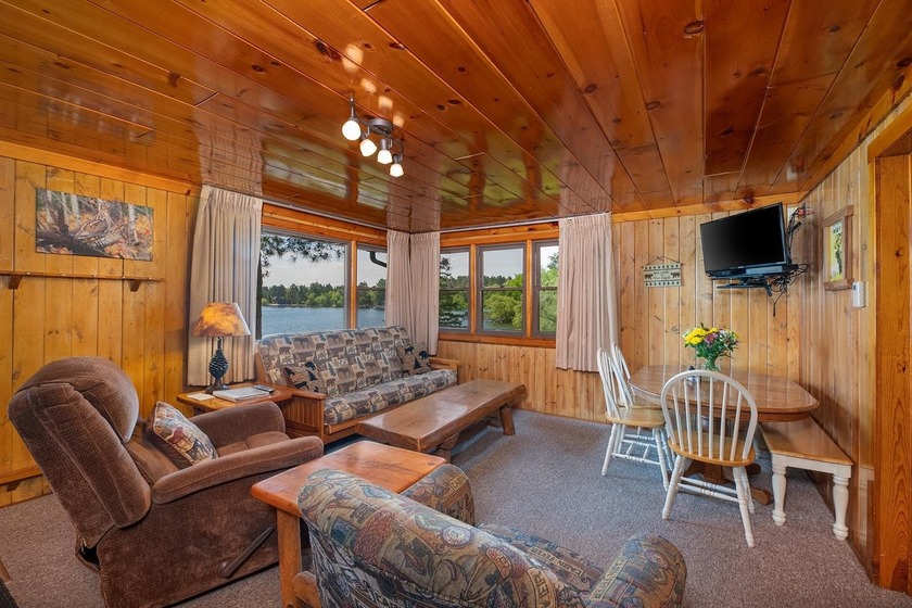 Situated on the crystal-clear shores of the stunning 1060-acre - photo 5