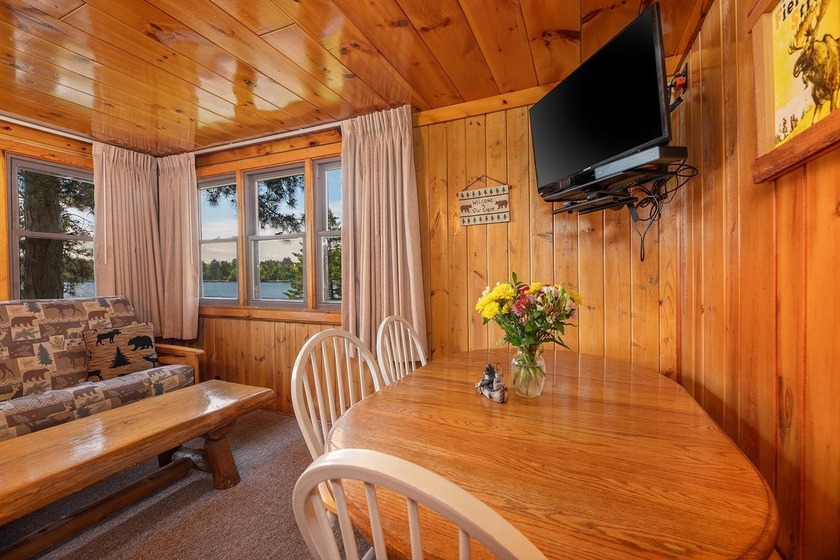 Situated on the crystal-clear shores of the stunning 1060-acre - photo 7