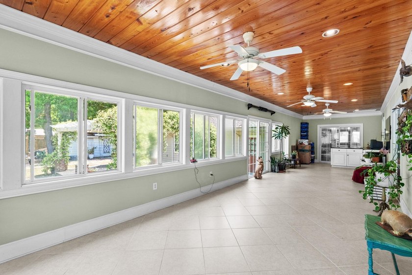 From the moment you arrive, this home tells a story. Over the - photo 23