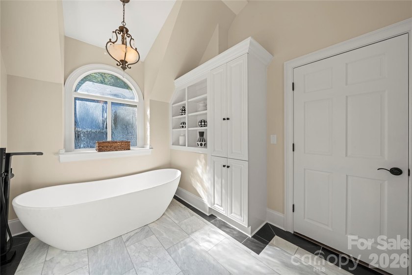Recently transformed with a number of upgrades, this stunning - photo 23