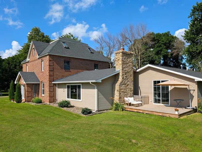 This stately brick home is a rare blend of timeless elegance - photo 2