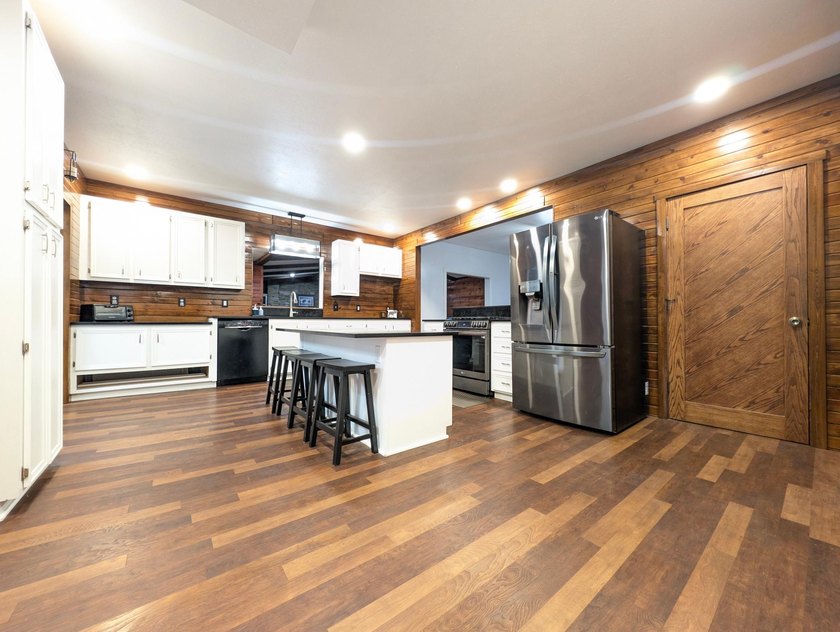 This stately brick home is a rare blend of timeless elegance - photo 9