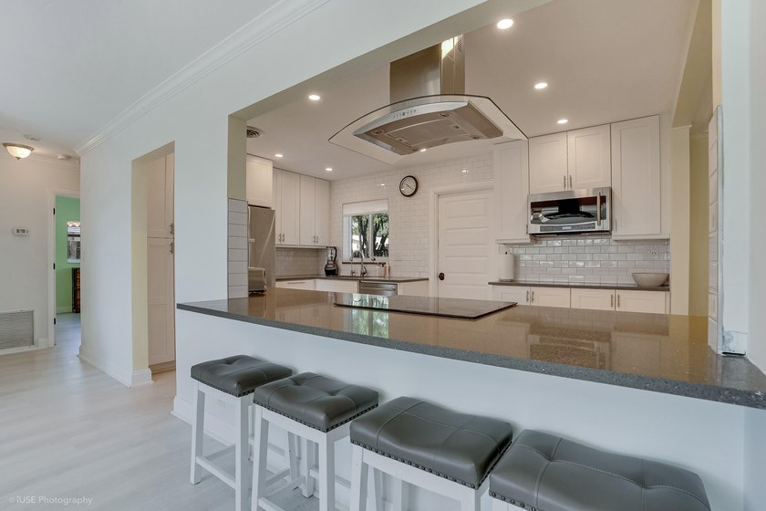 Welcome to this beautifully updated 4-bedroom, 2-bath pool home - photo 12