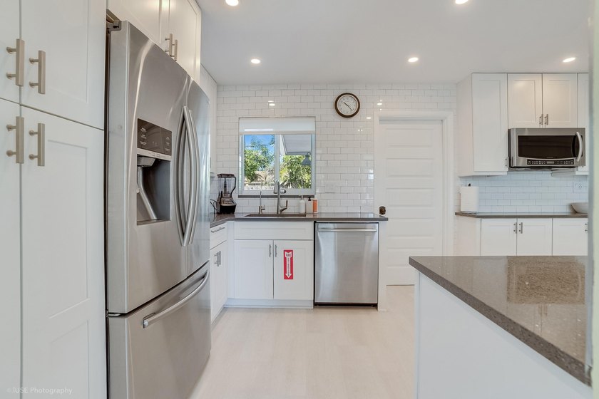 Welcome to this beautifully updated 4-bedroom, 2-bath pool home - photo 13