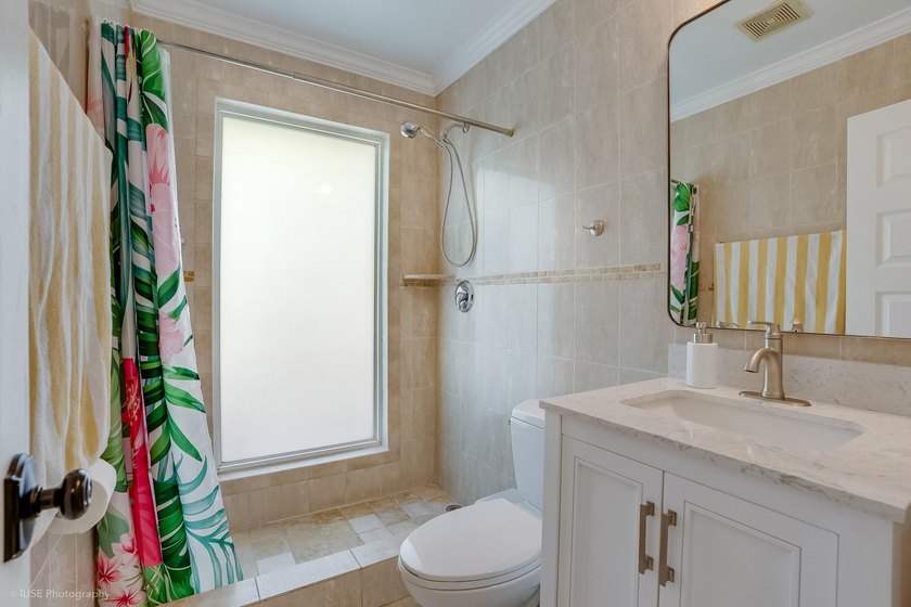 Welcome to this beautifully updated 4-bedroom, 2-bath pool home - photo 23