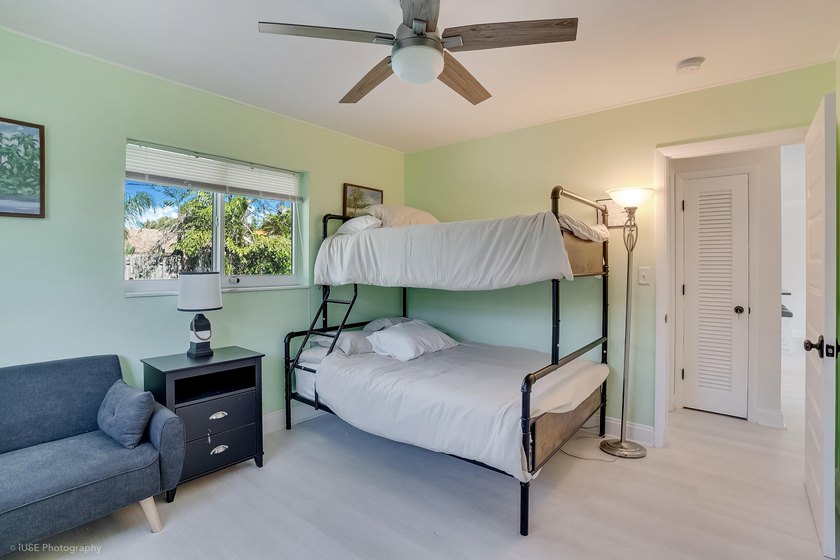 Welcome to this beautifully updated 4-bedroom, 2-bath pool home - photo 24