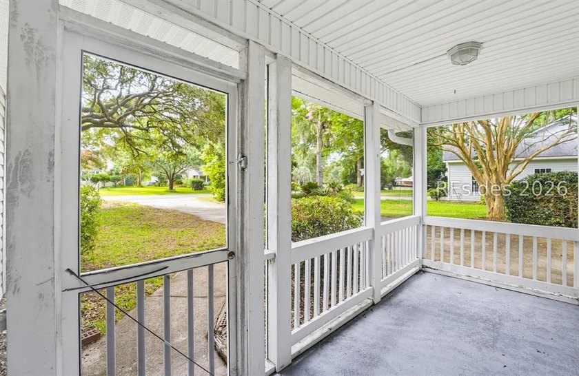 Set on a quiet street, 27 Telfair Drive offers a rare chance to - photo 4