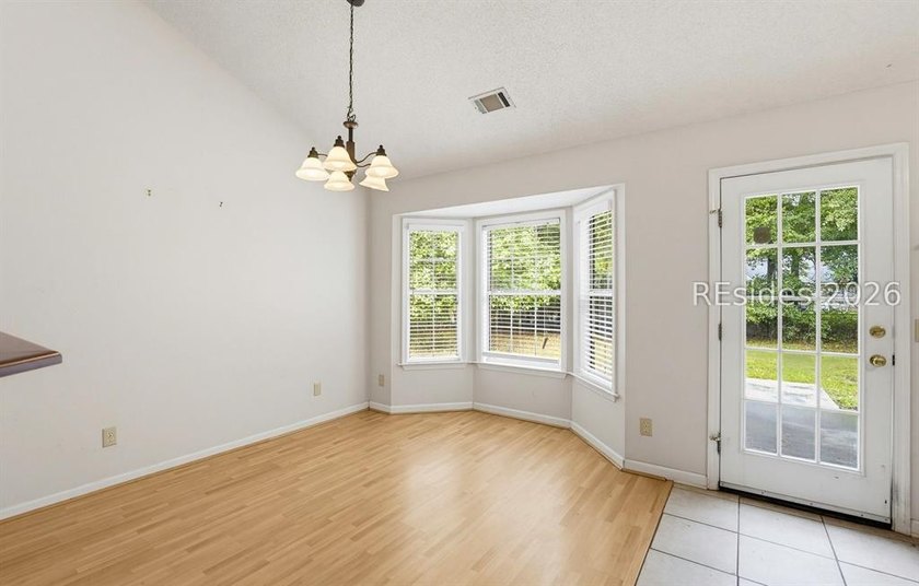 Set on a quiet street, 27 Telfair Drive offers a rare chance to - photo 10