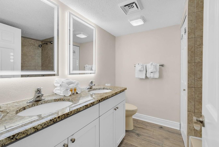 Welcome to Unit 207 at Beach Colony Resort, a charming 1-bedroom - photo 4