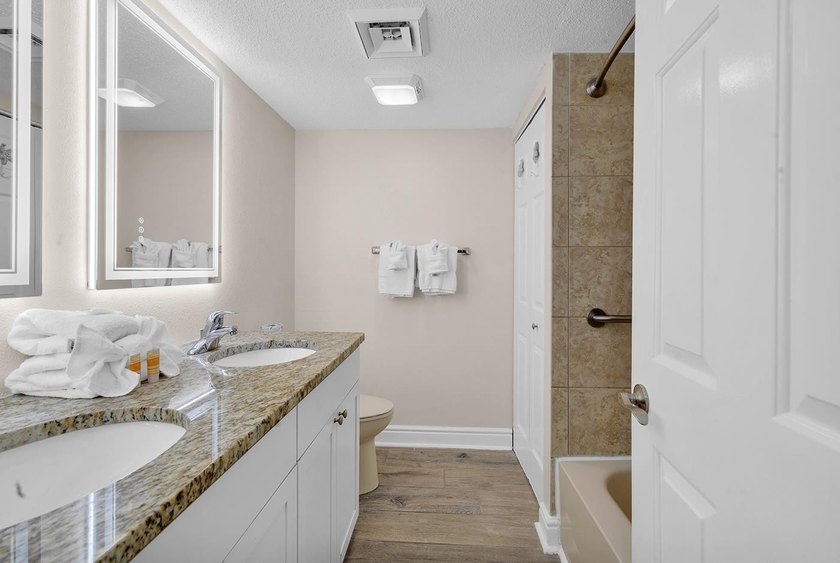Welcome to Unit 207 at Beach Colony Resort, a charming 1-bedroom - photo 5
