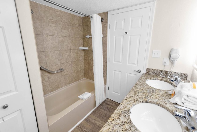 Welcome to Unit 207 at Beach Colony Resort, a charming 1-bedroom - photo 6