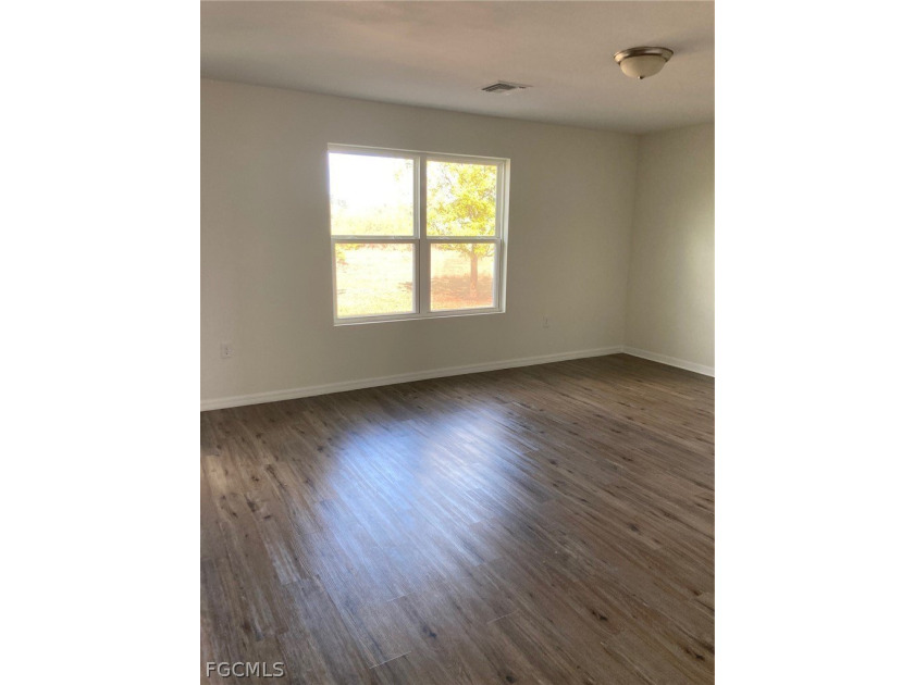 Step into this refreshed 2 story vinyl sided home with new cedar - photo 6