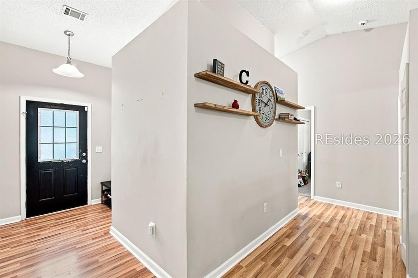 Welcome to this charming 4-bedroom, 2-bath home in the - photo 8