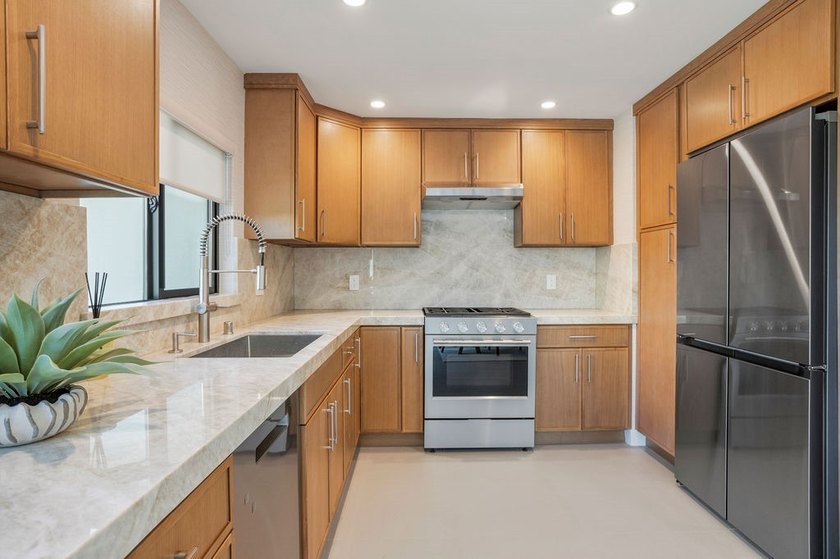 Welcome to 8711 Larkport Drive, a stunningly renovated residence - photo 13