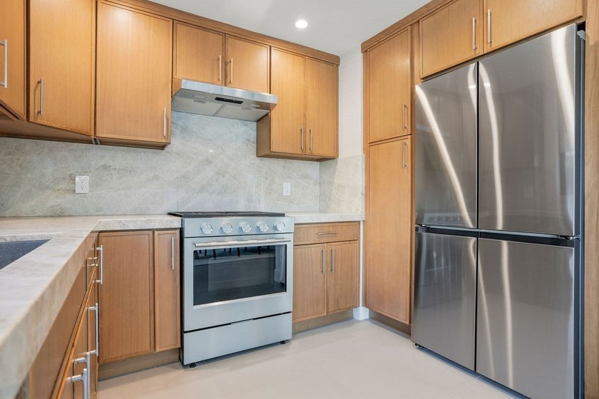 Welcome to 8711 Larkport Drive, a stunningly renovated residence - photo 16