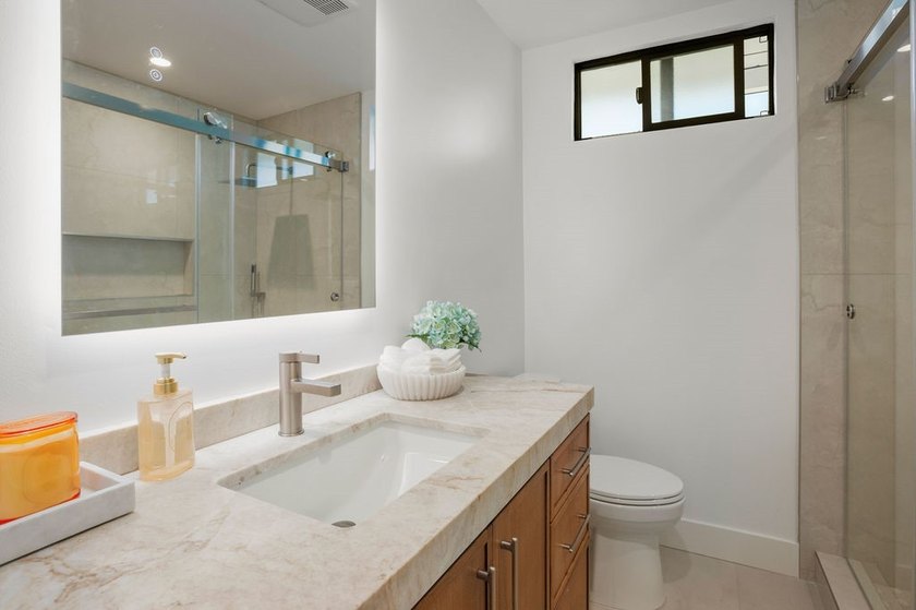 Welcome to 8711 Larkport Drive, a stunningly renovated residence - photo 25