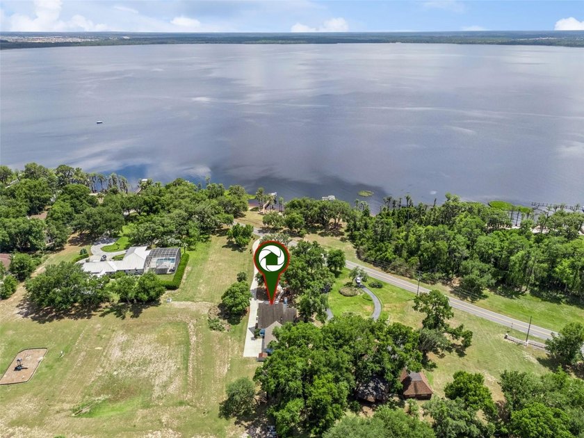 Experience the ultimate in lakefront living on the shores of - photo 2