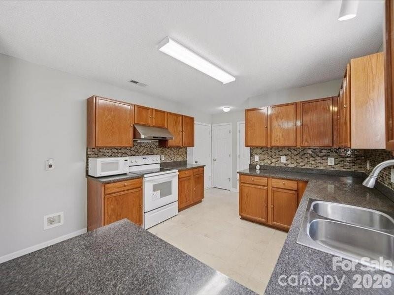 Welcome home to this well-maintained two-story residence - photo 17