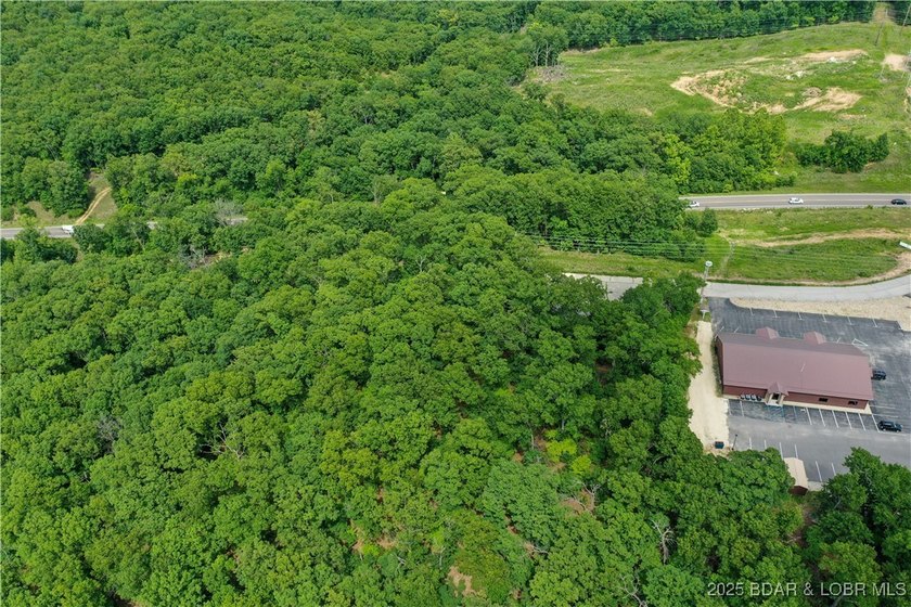 This expansive 5-acre commercial lot boasts exceptional frontage - photo 19