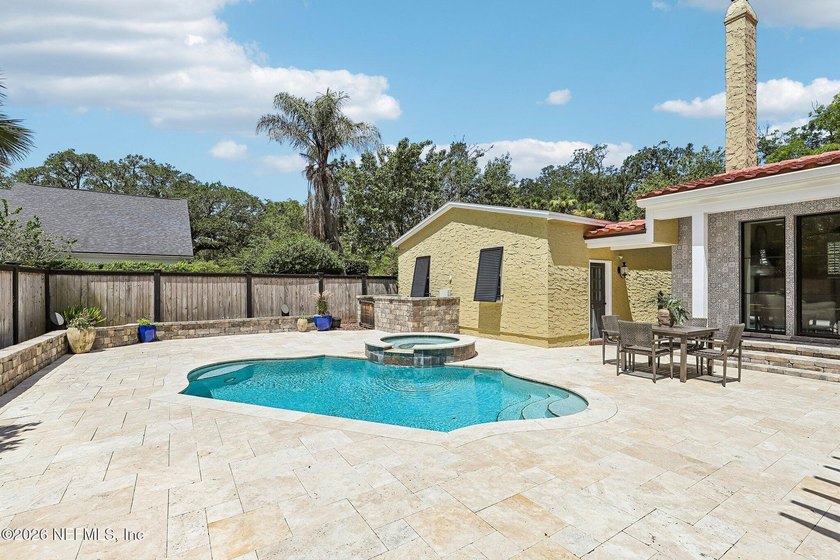 This exquisite block and stucco Mediterranean style home was - photo 50