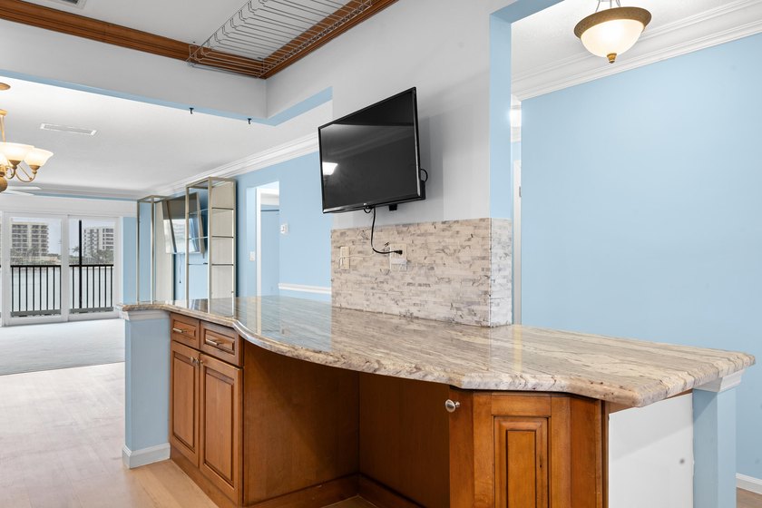 This remodeled condo offers breathtaking views of the turquoise - photo 11
