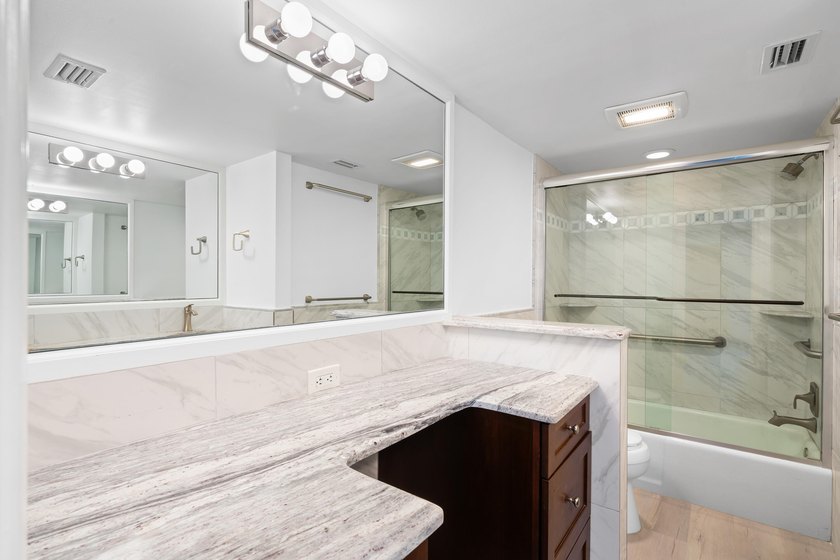 This remodeled condo offers breathtaking views of the turquoise - photo 22