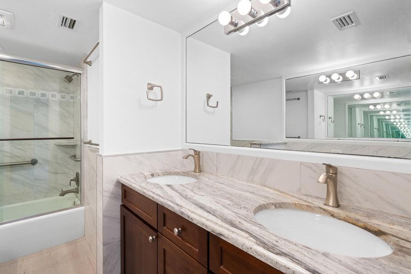 This remodeled condo offers breathtaking views of the turquoise - photo 23