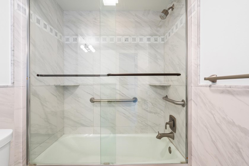 This remodeled condo offers breathtaking views of the turquoise - photo 24