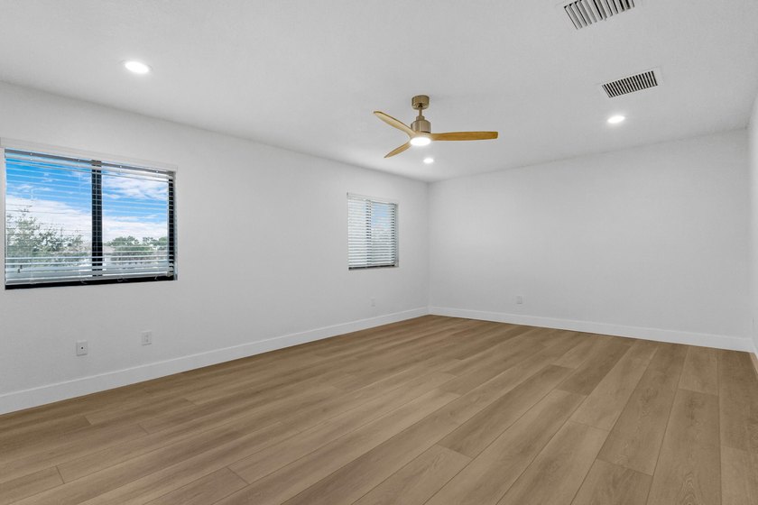 Fully renovated and move-in ready, this 5-bedroom, 3-bath home - photo 24