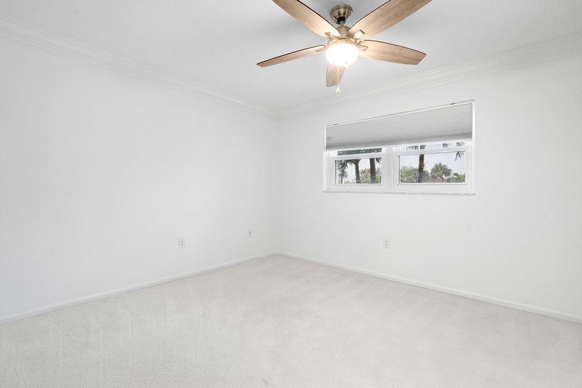 This remodeled condo offers breathtaking views of the turquoise - photo 26