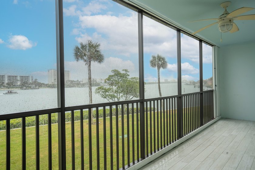 This remodeled condo offers breathtaking views of the turquoise - photo 28