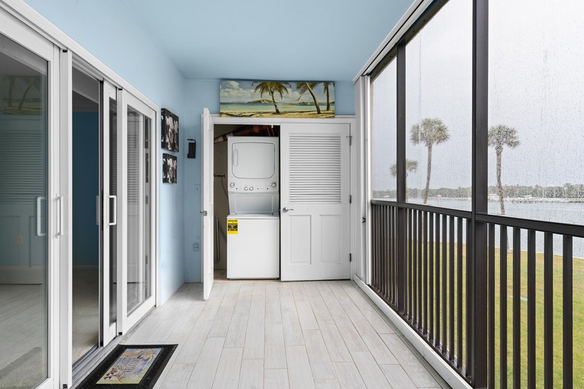 This remodeled condo offers breathtaking views of the turquoise - photo 29