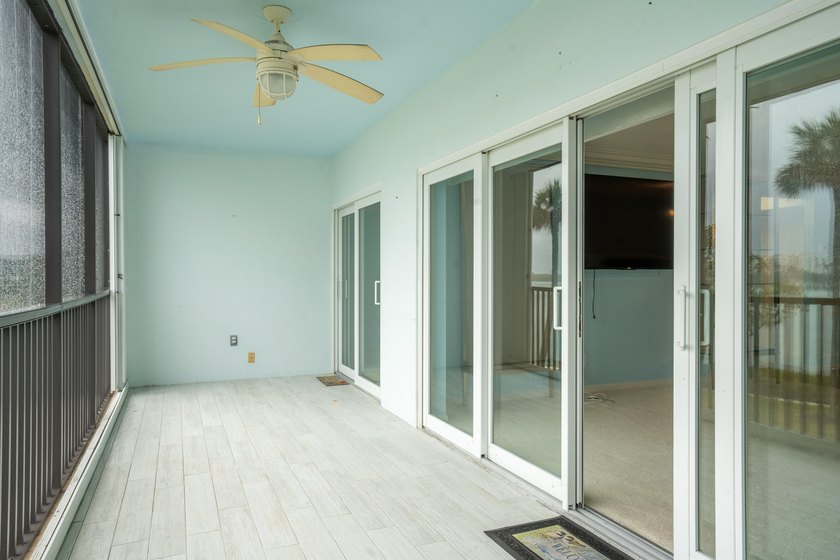 This remodeled condo offers breathtaking views of the turquoise - photo 30